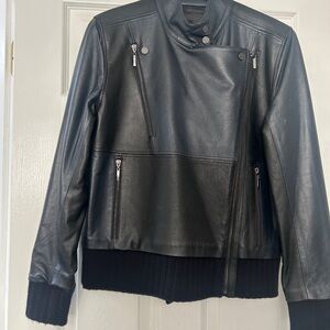 Black Leather Jacket with Zipper Details
